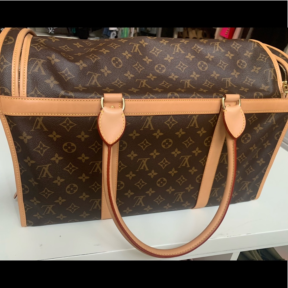 Beautiful Louis Vuitton Dog Carrier 50. Only used once. 19.5L x 9W x 13H.
